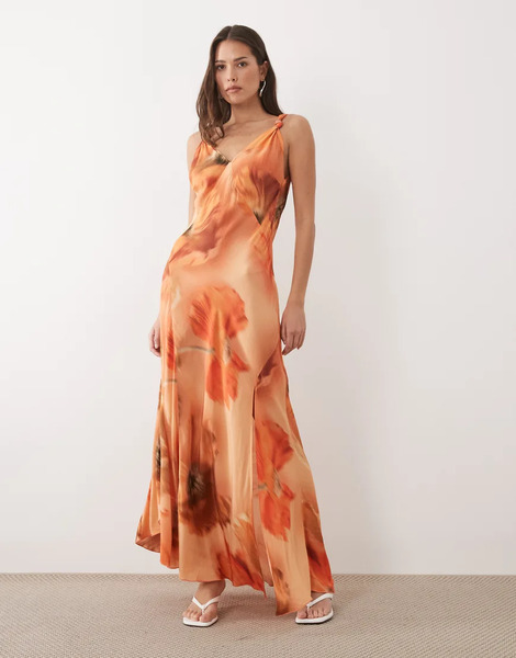  Never Fully Dressed Vestido Largo Naranja De Corte Al Bies Con Estampado Floral Difuminado Y Detalles Anudados En Los Tirantes Sofia De Never Fully Dressed 