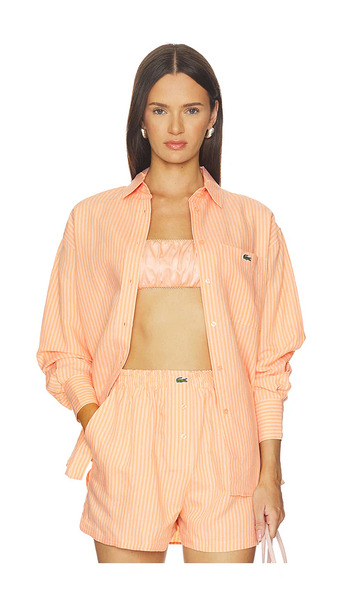  Lacoste Camisa De Corte Oversize Con Estampado Toile En Color Durazno Talla 36  (también En 38, 40, 42). 